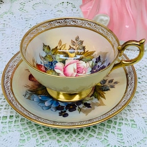 Aynsley artist signed teacup and saucer circa 1939+.