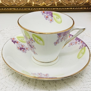 Tasse à thé et soucoupe peinte à la main en porcelaine de Chine Phoenix.