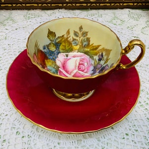 Aynsley artist signed teacup and saucer circa 1939+.