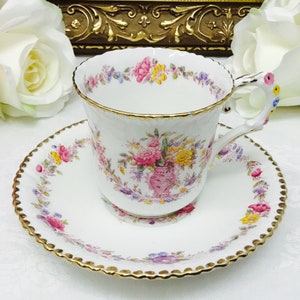 Royal Stafford flower handle teacup and saucer.