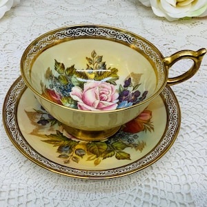 Aynsley artist signed teacup and saucer circa 1939+.