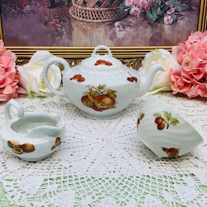 Burgess and Leigh Ironstone teapot with cream and sugar.