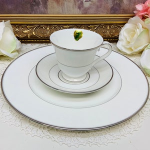 Waterford “Lismore Platinum” dinner plate with teacup and saucer.