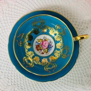 Aynsley Athen style artist signed teacup and saucer circa 1934-1950.