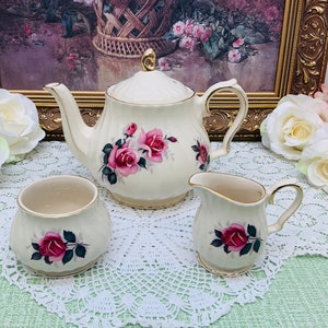 Sadler Cabbage Roses teapot with cream and sugar.