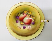 Paragon artist signed double warranted teacup and saucer.