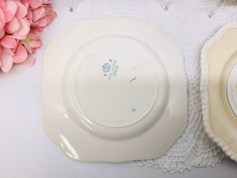 Set of four Johnson Bros Old English luncheon plates