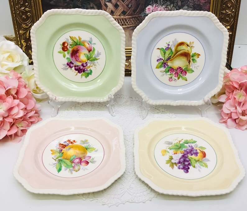 Set of four Johnson Bros Old English luncheon plates