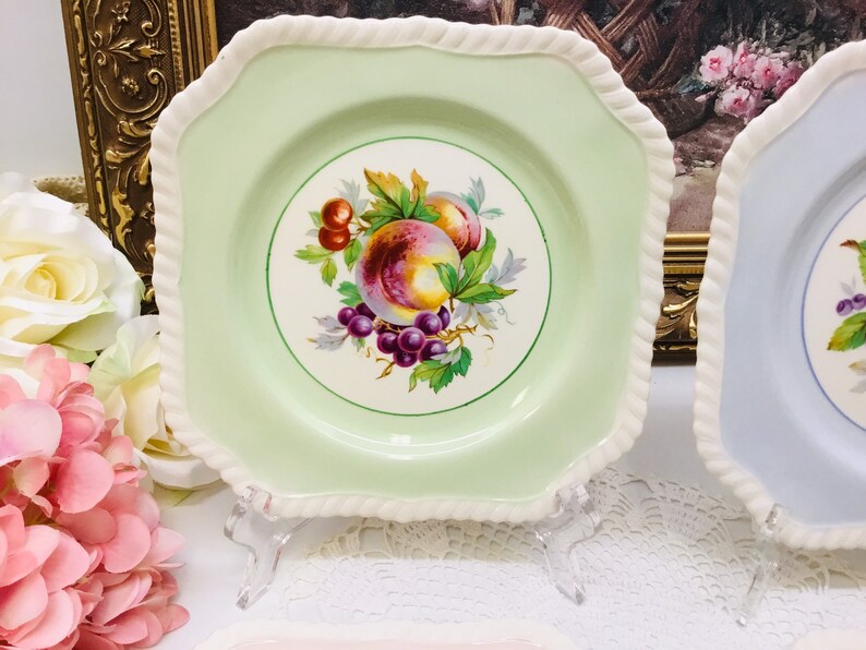 Set of four Johnson Bros Old English luncheon plates