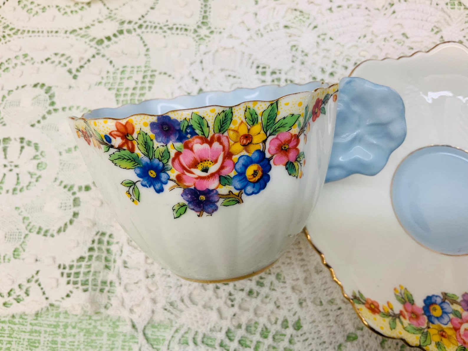 Star Paragon Primrose Border Flower Handle Teacup and Saucer Circa 1923