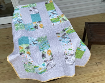 Baby quilt or toddler quilt with the JUNGLE theme