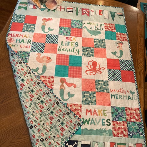 Handmade quilt hotsell with the MERMAID theme. Perfect beach quilt