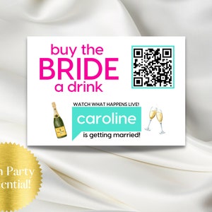 May include: A pink and white printable sign with a QR code that says "buy the BRIDE a drink" and "WATCH WHAT HAPPENS LIVE! caroline is getting married!" with a champagne bottle and two champagne glasses.