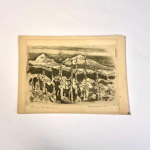 May include: An antique etching of a winter landscape featuring trees and mountains. The artwork is in black and white, with the text "Merry Christmas!" and a signature in the lower right corner. The paper has a cream color.