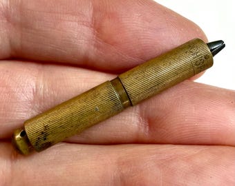 Victorian Brass Push-Button Mechanical Pencil, Ca: 1869.