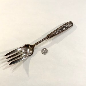 Repousse Sterling Meat Fork, Sterling Handle, Ca: 1930s.