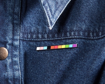 The LGBT Progress Rod Enamel Pin