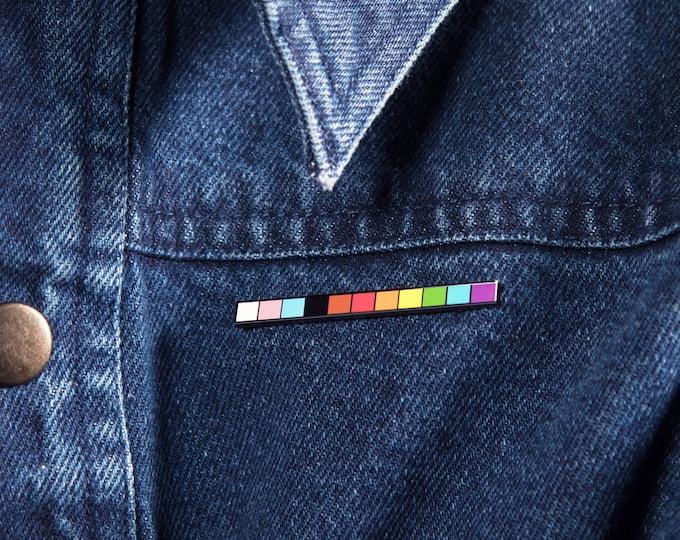 The LGBT Progress Rod Enamel Pin