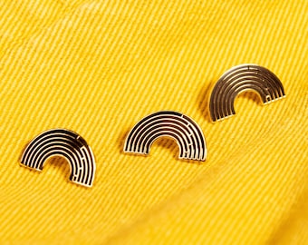 The Black & Gold Rainbow Enamel Pin