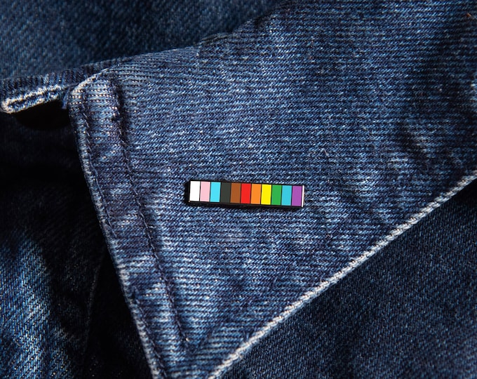 The Progress Rainbow Baton Pin
