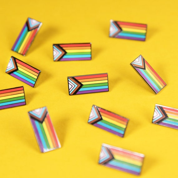 The Progress Pride Flag Enamel Pin