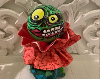 Vintage inspired zombie knee hugger doll