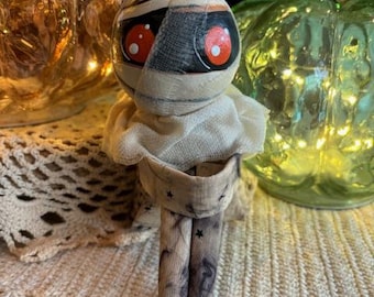 Vintage inspired one eyed mummy knee hugger doll