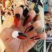 Patty Adkins reviewed Harley Quinn Batman Stiletto Nails, Long or Short, Gothic Comic Book Press on Nails, Acrylic False Fake Nails, Coffin, Square, Red & Black