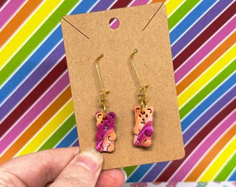 Pendientes de arcilla polimérica con forma de osito de goma en espiral naranja y rosa *Piezas únicas*