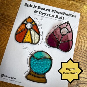 May include: Stained glass spirit board planchette and crystal ball charms in orange, yellow, pink, and teal. The charms are on a white paper with the text "Spirit Board Planchettes & Crystal Ball" and "Digital Download".