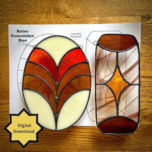 May include: Two stained glass suncatchers, one oval and one rectangular, with a retro design. The oval suncatcher features cream, red, and brown glass. The rectangular suncatcher has a diamond shape in the center. The text "Retro Suncatcher Duo" and "Digital Download" are visible.
