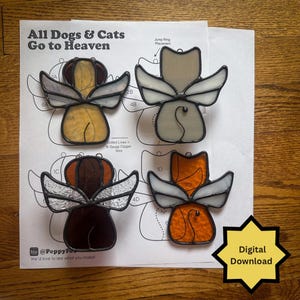 May include: Four stained glass angel pet ornaments, each depicting a dog or cat with wings. The ornaments are in shades of brown, tan, gray, and orange. The background includes a paper with the text "All Dogs & Cats Go to Heaven" and a "Digital Download" graphic.