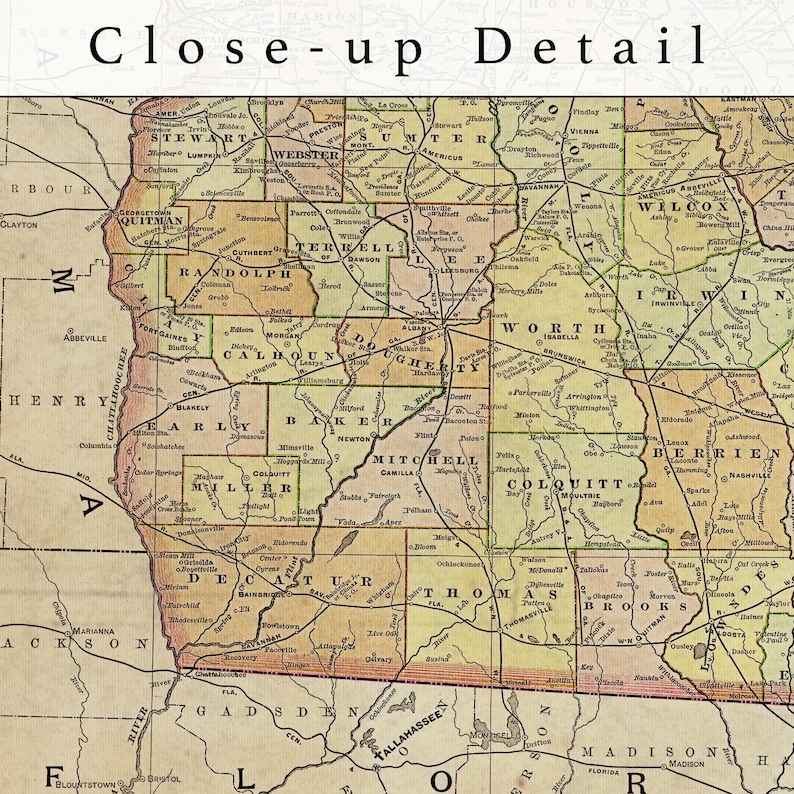 May include: A vintage map of the state of Georgia, showing county boundaries and major cities. The map is printed in shades of green, yellow, and brown, with black lines for roads and rivers. The map is titled "Close-up Detail" and is likely from the early 20th century.