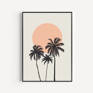 May include: A minimalist art print featuring three palm trees silhouetted against a peach-colored sun on a light beige background.