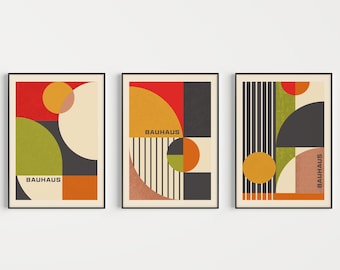 May include: Three abstract geometric art prints with a Bauhaus theme. Each print features a different combination of circles, squares, and stripes in red, orange, yellow, green, brown, and black.