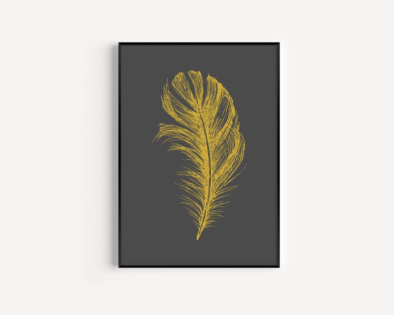 May include: A single golden feather on a dark gray background. The feather is detailed and realistic, with a delicate, intricate design.