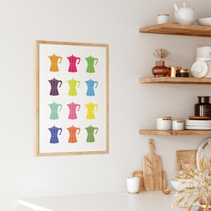 May include: A framed print of a colorful pattern of 12 Italian coffee makers, or moka pots, in various colors, including red, blue, green, yellow, and purple.