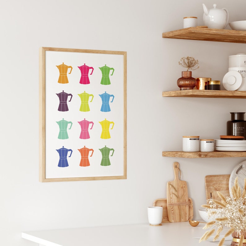 May include: A framed print of a colorful pattern of 12 Italian coffee makers, or moka pots, in various colors, including red, blue, green, yellow, and purple.
