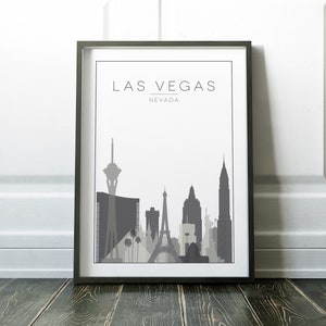K&ouml;nnte beinhalten: Eine Schwarzwei&szlig;illustration der Skyline von Las Vegas mit dem Text "Las Vegas, Nevada" oben. Die Illustration zeigt den Stratosphere Tower, die Nachbildung des Eiffelturms und andere ber&uuml;hmte Geb&auml;ude.