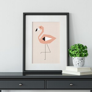 May include: A framed print of a pink flamingo with black and white geometric details on a light pink background.