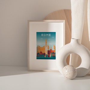 May include: A framed print of a cityscape with the word "ROME" at the top. The cityscape is a silhouette of buildings in shades of orange, red, and yellow against a blue background.