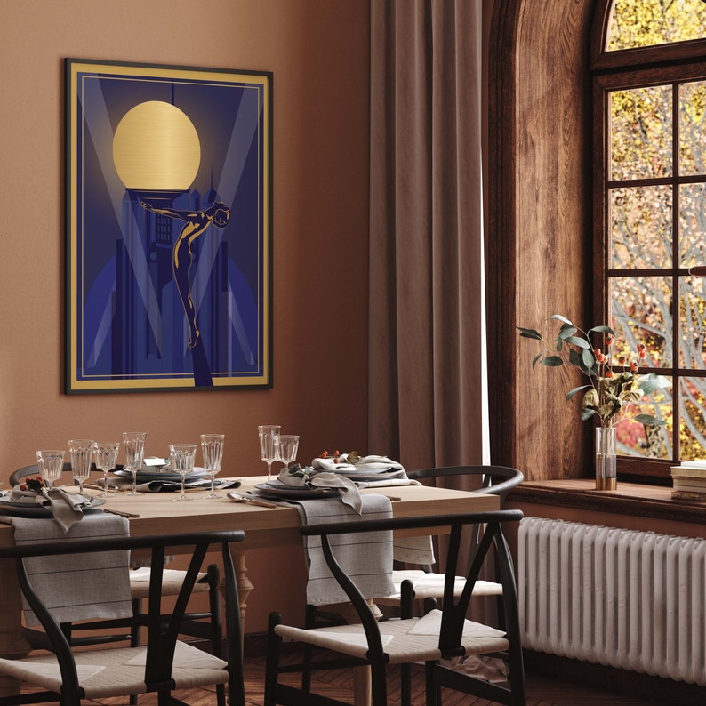 May include: A framed illustration of a woman standing on a building with a large moon in the background. The illustration is in a blue, gold, and black color scheme.