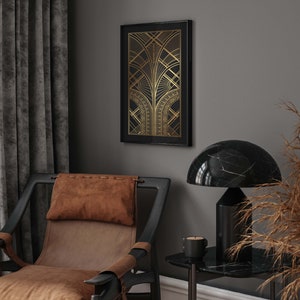 May include: A black framed print with a gold geometric design on a gray wall. A brown leather armchair with a brown pillow is in the foreground. A black marble lamp with a black base is on a black marble side table.