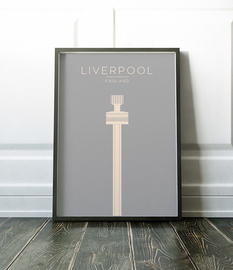 May include: A minimalist poster with a gray background and a white outline of the Liver Building in Liverpool, England. The text "LIVERPOOL" and "ENGLAND" is printed in white at the top of the poster.