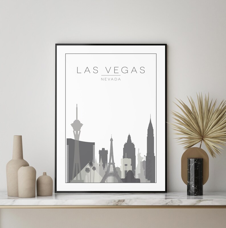 K&ouml;nnte beinhalten: Eine Schwarzwei&szlig;illustration der Skyline von Las Vegas mit dem Text "LAS VEGAS, NEVADA" oben. Die Skyline umfasst den Stratosphere Tower, die Bellagio-Springbrunnen und das Wynn Hotel.