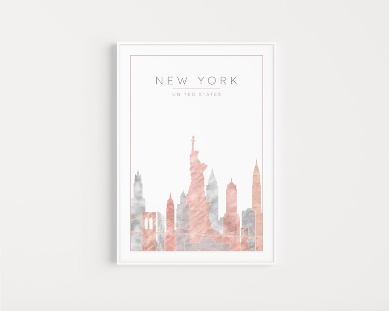 May include: A printable art print featuring a rose gold and silver silhouette of the New York City skyline, including the Statue of Liberty. The text "NEW YORK" and "UNITED STATES" is printed below the skyline.