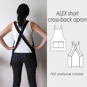May include: A person wearing a black cross-back apron over a white tank top and black jeans. The apron design is shown in a line drawing, with the text "ALEX short cross-back apron" and "PDF pattern & tutorial".