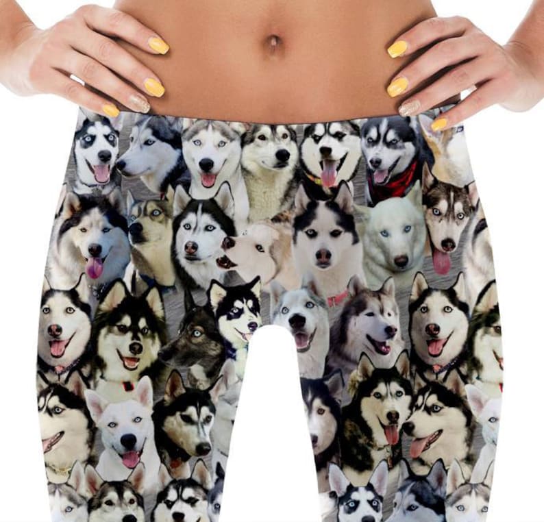 May include: Black and white leggings with a pattern of many husky dog faces.