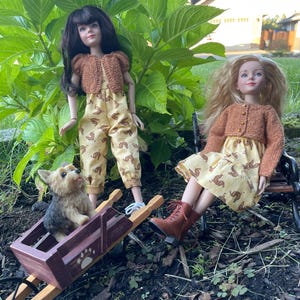 May include: A rustic wooden sign with the text "Welcome to our home" in white lettering. The sign features a distressed finish and a simple, inviting design, perfect for front door decor.