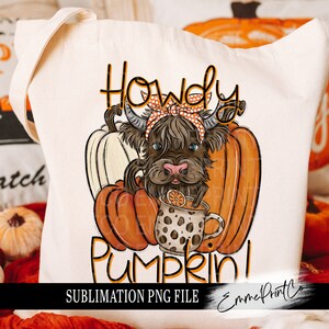May include: A sublimation design featuring a Highland cow wearing a red and white polka dot bandana, holding a mug of pumpkin spice with a slice of orange, and sitting in front of two pumpkins. The text "Howdy Pumpkin!" is written above the cow and "Sublimation PNG File" is written below the cow.